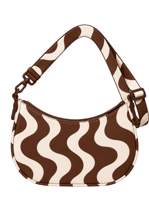 KYNVA Roam waterproof crossbody bag in brown and cream wave print, back view