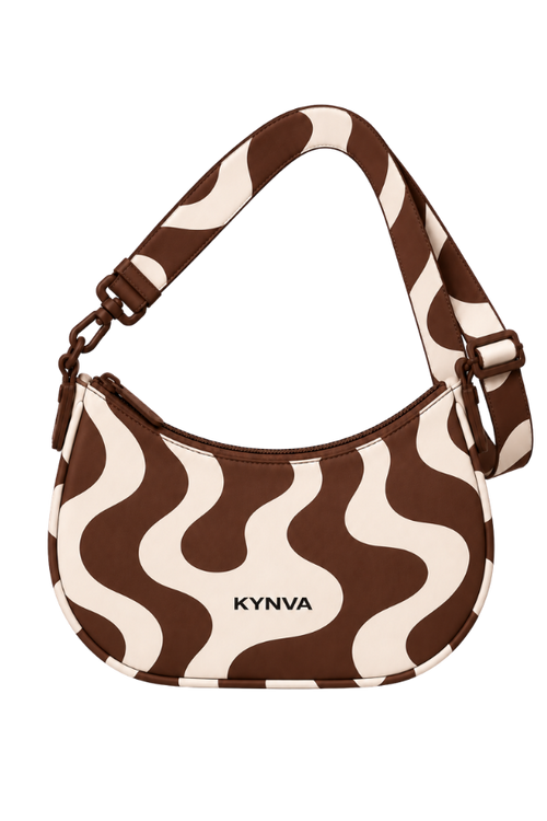 KYNVA Roam waterproof crossbody bag in brown and cream wave print, front view